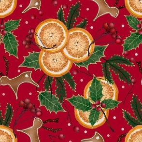 It's Christmas time with dried oranges, holly, green pine and homemade reindeer cookies. Red background