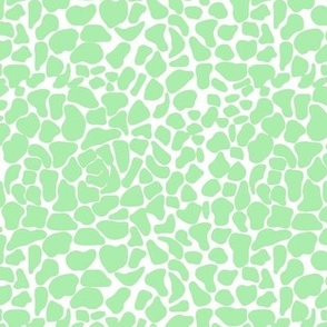 lime green animal skin print from Anines Atelier. Contemporary and playful style