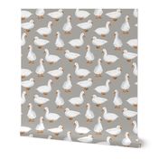 Cute White Puddle Ducks on Grey Burlap by Brittanylane