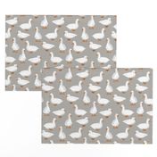 Cute White Puddle Ducks on Grey Burlap by Brittanylane