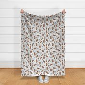 Woodland Brown Bears, Pine Cones, Stars, and Moon on Woven Distressed White