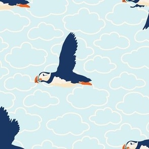 Large Puffin Sky with Clouds and a Sky Blue Background