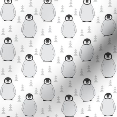 small penguins with triangle trees on white