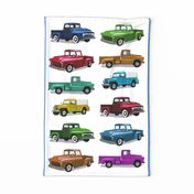 1956 Pickup trucks on white linen tea towel sideways