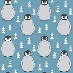 medium penguins with triangle trees on blue