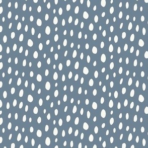 Spotty_cream on pale blue_medium