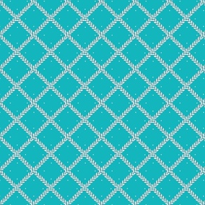 Childrens_novelty_pattern_with_all_over_small_polka_dots_and_herringbone_turquoise_stock