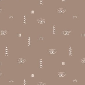 Moroccan kelim design with eyes and sunshine and berber symbols beige on latte brown