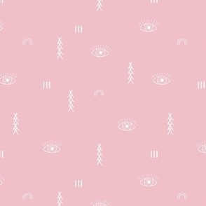 Moroccan kelim design with eyes and sunshine and berber symbols white on pink
