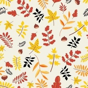 Colorful autumn leaves on beige