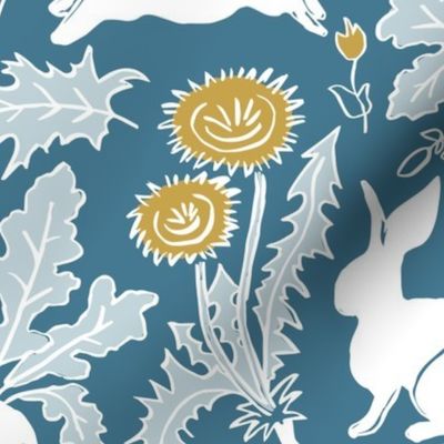 white rabbits and vegetables on teal blue | medium