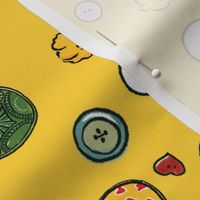 Sewing buttons - yellow