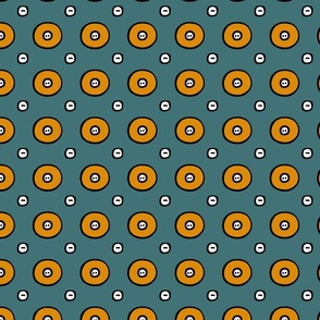 Lots of round orange buttons on   aqua green - large