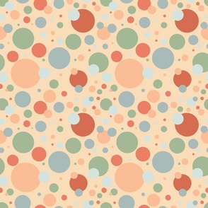 Blue, green, and orange circles on a peach background 