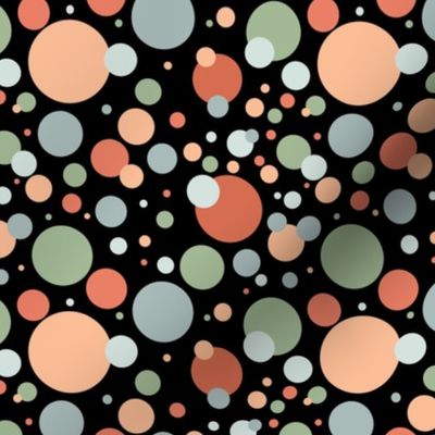 Blue, green, and orange circles on a black background