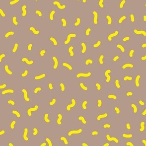 Retro swirls and sprinkles minimalist trendy pop design nineties vibes yellow on beige tan