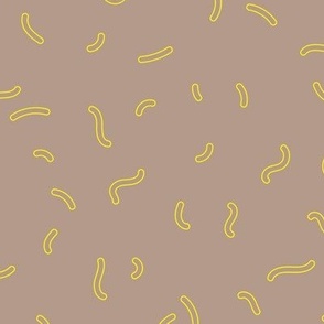 Retro swirls and sprinkles minimalist trendy pop design nineties vibes outlines yellow on tan latte