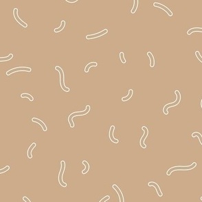 Retro swirls and sprinkles minimalist trendy pop design nineties vibes outlines white on tan beige