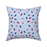 Popsicle summer 4th of july celebration stars and stripes kids american ice-cream usa national holiday on light blue