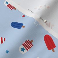 Popsicle summer 4th of july celebration stars and stripes kids american ice-cream usa national holiday on light blue