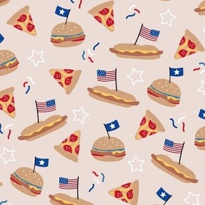 American diner Holiday celebration dinner hamburgers sandwich pizza and hotdogs 4th of July stars and stripes usa flag and confetti red blue on sand