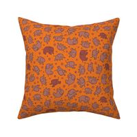 Elephants and Daisies - brown and terracotta on orange