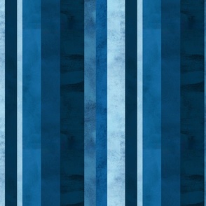 Old wall with blue vertical stripes