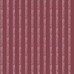 Squiggly pin stripes on wine red