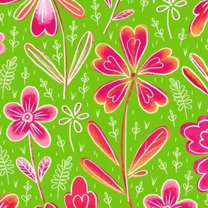 Flowers drawn in chalk, pink and orange on a green background