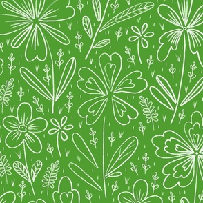 Flowers drawn in chalk, white on a dark green background