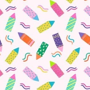 colorful crayon on pink background