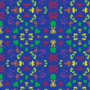 Green, Yellow, Red , Orange, and Purple Leaves on Blue Background
