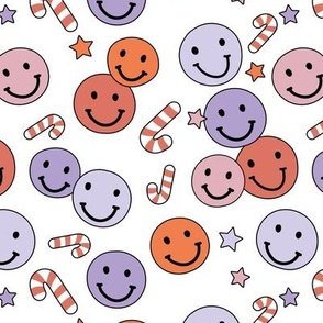 Happy holidays smiley christmas with smileys candy canes and stars retro style seasonal design vintage red pink lilac purple on white