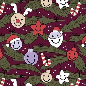Happy holidays smiley christmas with smileys candy canes mistletoe and tree branches vintage red lilac green on burgundy