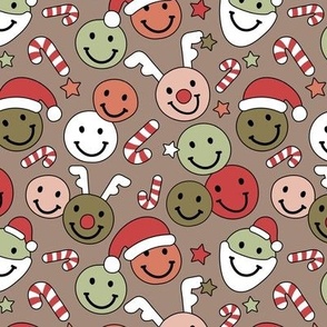 Happy holidays smiley christmas with smileys stars happy santa claus candy cane and reindeer vintage orange red green min on slate