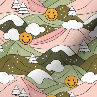 Happy holidays colorful Christmas smileys retro winter wonderland snowy mountains and christmas trees pink blush pink green yellow
