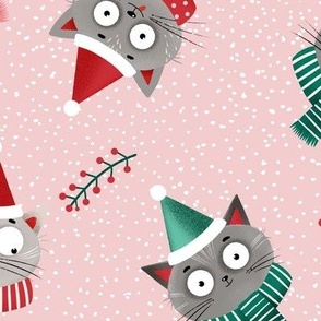 Cute Christmas cats in red Santa hats and scarfs on pink background, medium scale