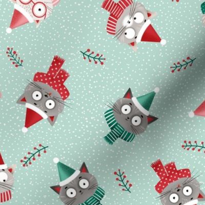 Medium | Christmas cats in red Santa hats and scarfs on green mint background, medium scale