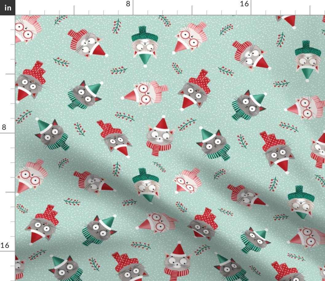 Medium | Christmas cats in red Santa hats and scarfs on green mint background, medium scale