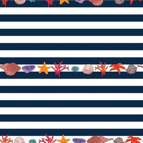 Sailor fabric with fun seashells, shells, starfish, coral on a white and navy blue striped background. 16 inches.