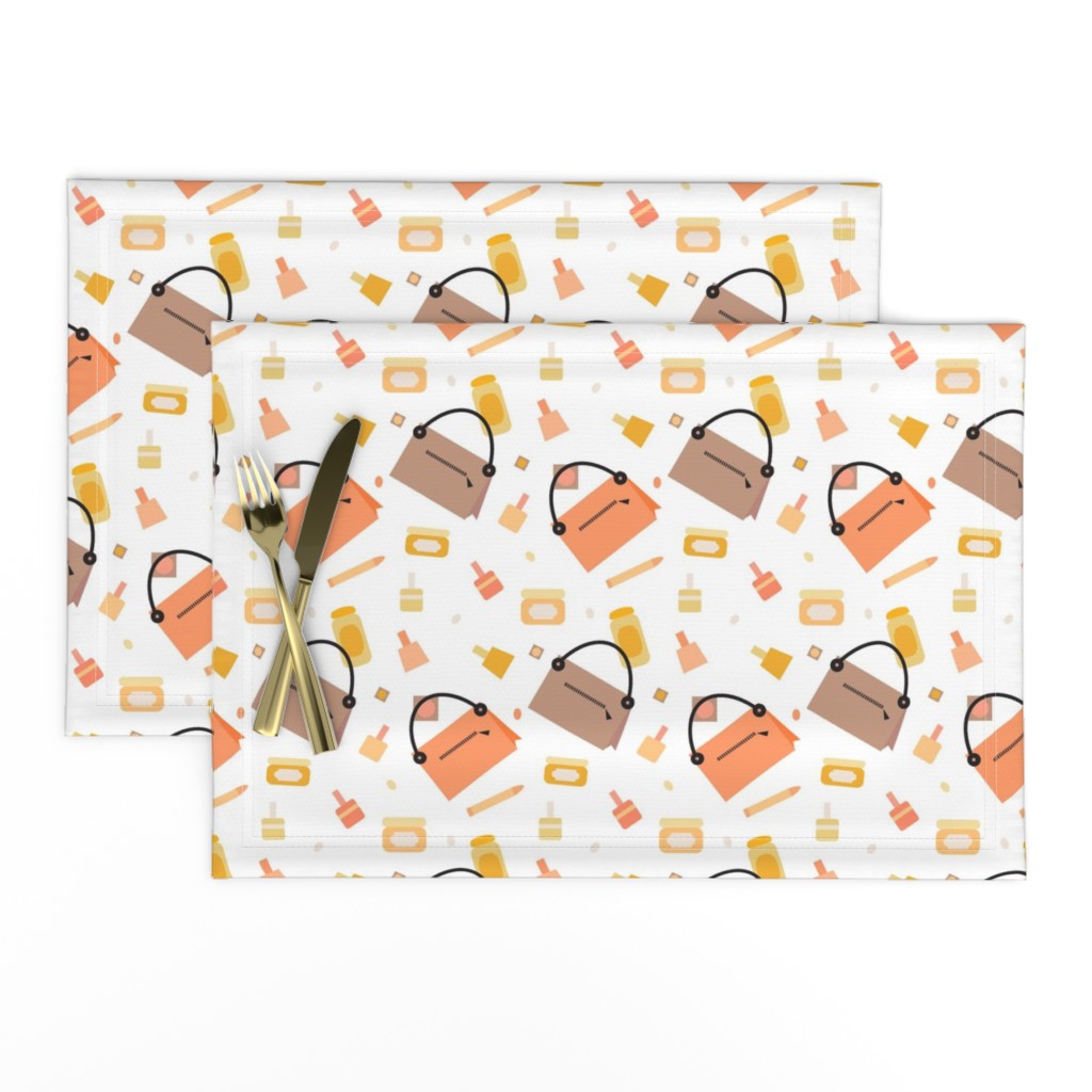 small makeup and purse design on white background