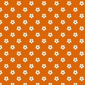 Small seventies flowers in creamy white on orange - xs