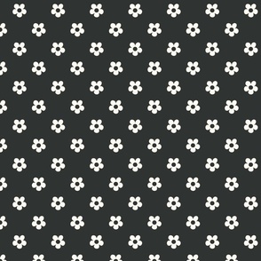 Small seventies flowers in creamy white on washed out black - xs
