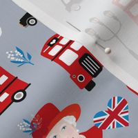 Queen birthday celebration with UK flag corgi dogs and double decker bus black cab and bog ben english icons red on gray 