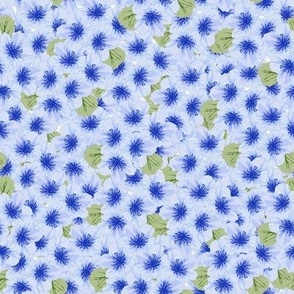 Blue Blossoms-Allover, blossoms in tones of blue with soft green leaves.
