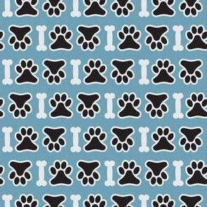 dog paw and bone on blue background  - small