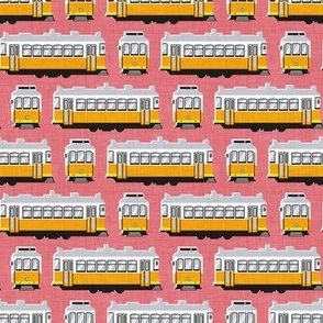 Tiny  scale // Lisbon trams // watermelon pink background lemon lime and marigold transport