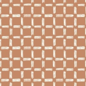 Medium | 1” Hand drawn cream grid on caramel brown