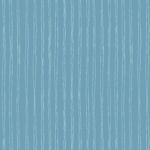 Thin white vertical stripes on blue