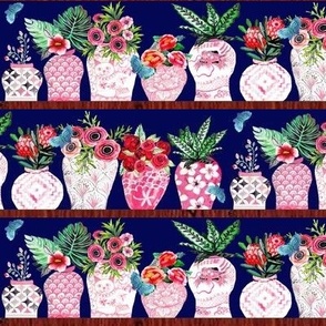 Pink Ginger jars and Foo dogs on dark blue with  peony, hibiscus, Anemone and Protea plants in pink and  red